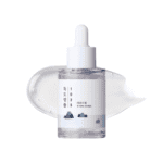 Frasco da 1025 Dokdo Ampola 200ml da Round Lab, tratamento intensivo para hidratação profunda e fortalecimento da barreira cutânea.