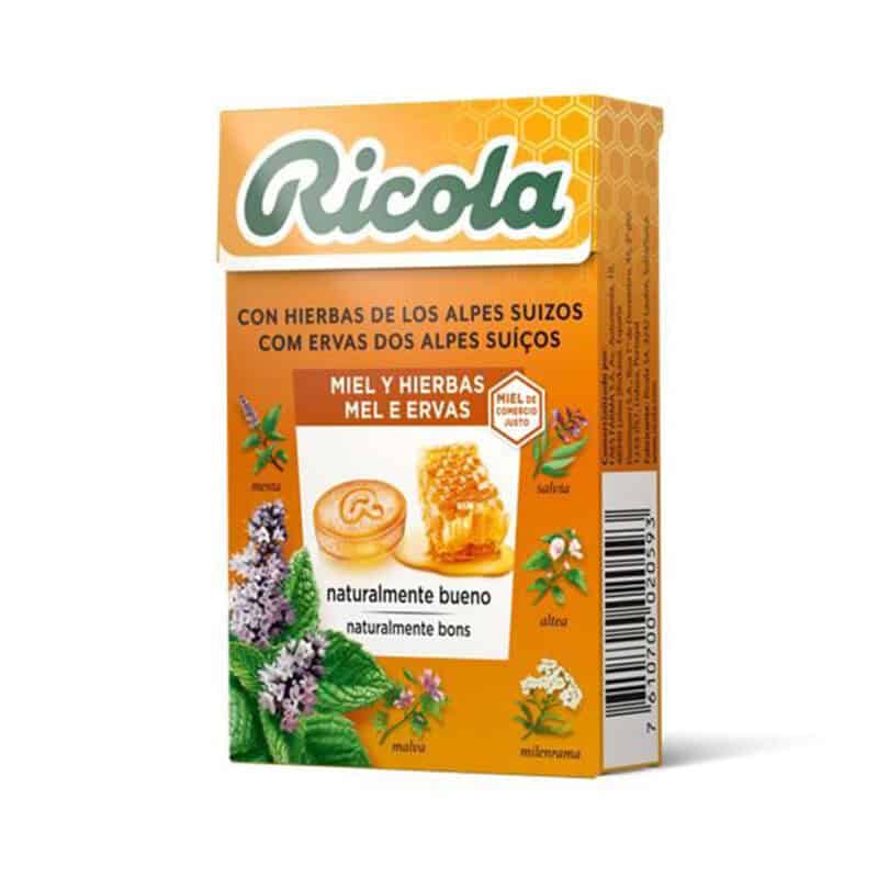Rebuçados Ricola de Mel e Ervas em embalagem de 50g, feitos com mel natural e 13 ervas suíças para suavizar e acalmar a garganta.