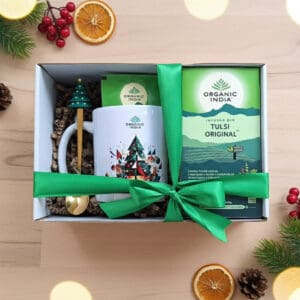 Infusão ayurvédica Tulsi Original Organic India em embalagem de Natal, com mistura herbal biológica e design festivo.