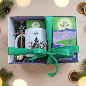 Infusão ayurvédica Tulsi Sleep Organic India em embalagem de Natal, com mistura biológica relaxante e elementos festivos.
