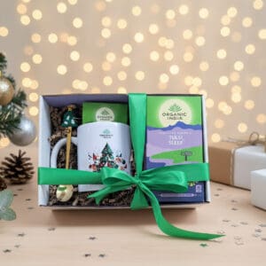 Infusão ayurvédica Tulsi Sleep Organic India em embalagem de Natal, com mistura biológica relaxante e elementos festivos.