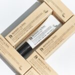 Bálsamo Labial Honest 10ml Benton com sete óleos vegetais, manteiga de karité e vitamina E
